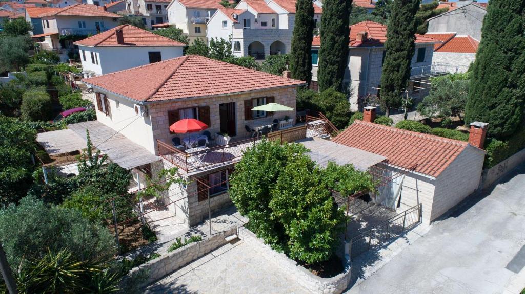 an aerial view of a house with a roof at Apartments Smilja - great location in Supetar