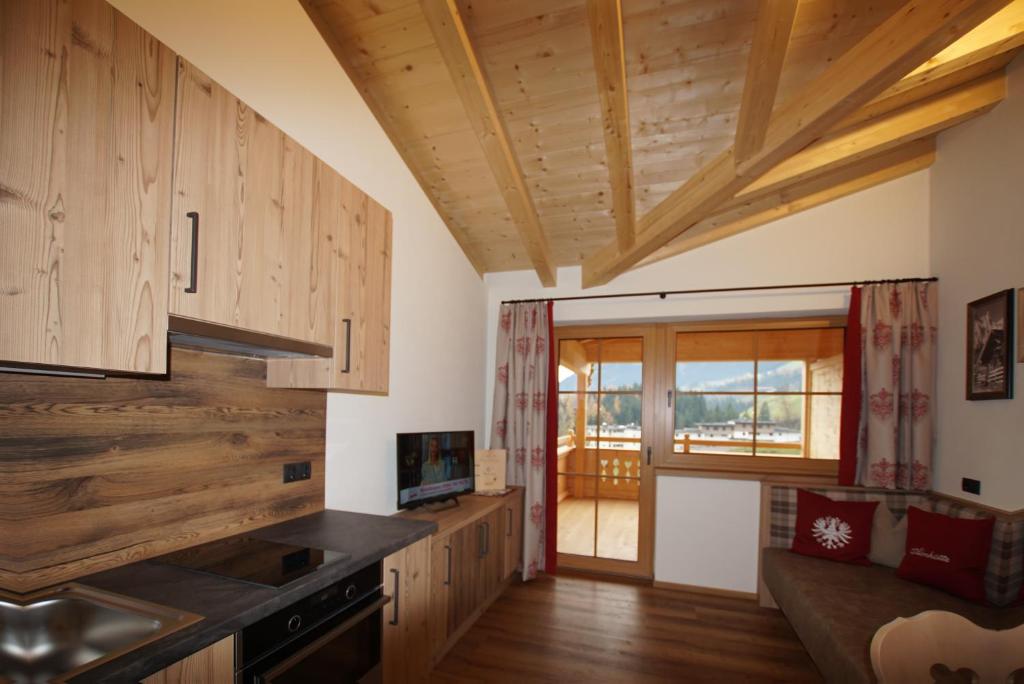 Kuchyň nebo kuchyňský kout v ubytování Gasthaus Goglhof