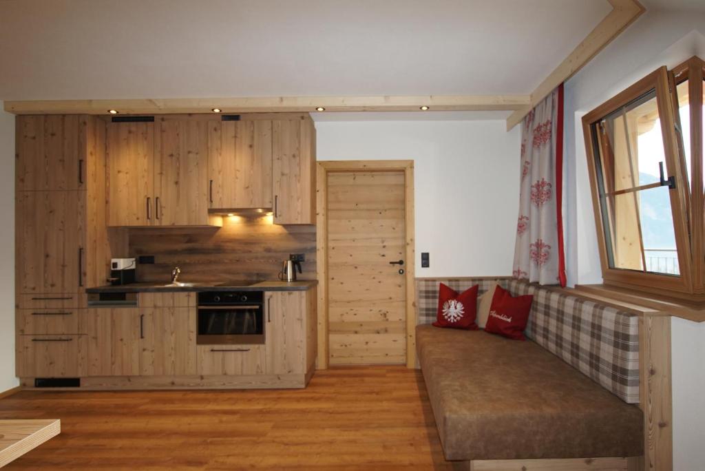 Kuchyň nebo kuchyňský kout v ubytování Gasthaus Goglhof