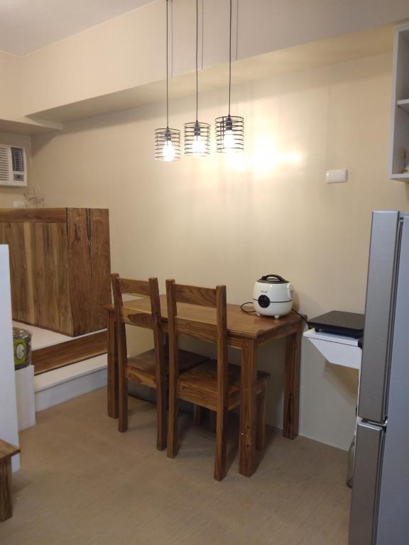 Kuchyň nebo kuchyňský kout v ubytování Avida Atria Khalexa's Place Iloilo