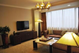 TV a/nebo společenská místnost v ubytování Zhongshan International Hotel