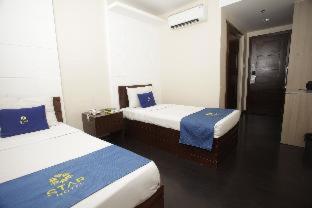 Postel nebo postele na pokoji v ubytování Star Hotel