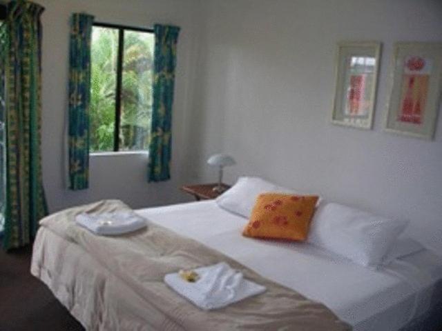 Postel nebo postele na pokoji v ubytování Bohemia Resort Cairns