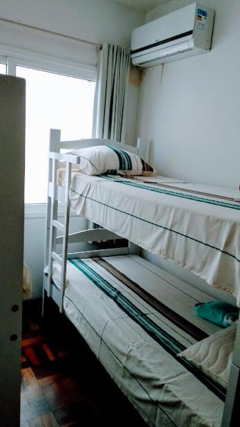  CASA TOP 3 QUARTOS NO CENTRO DE BALNEÁRIO