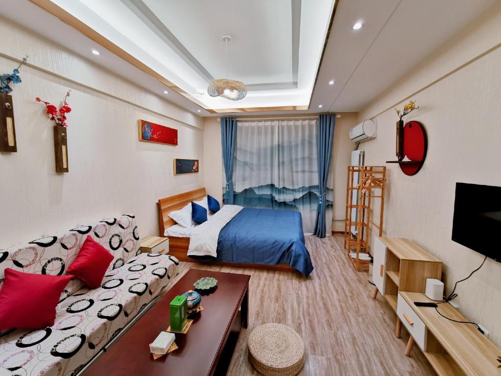 TV a/nebo společenská místnost v ubytování Yu Jing Xuan Boutique Apartment