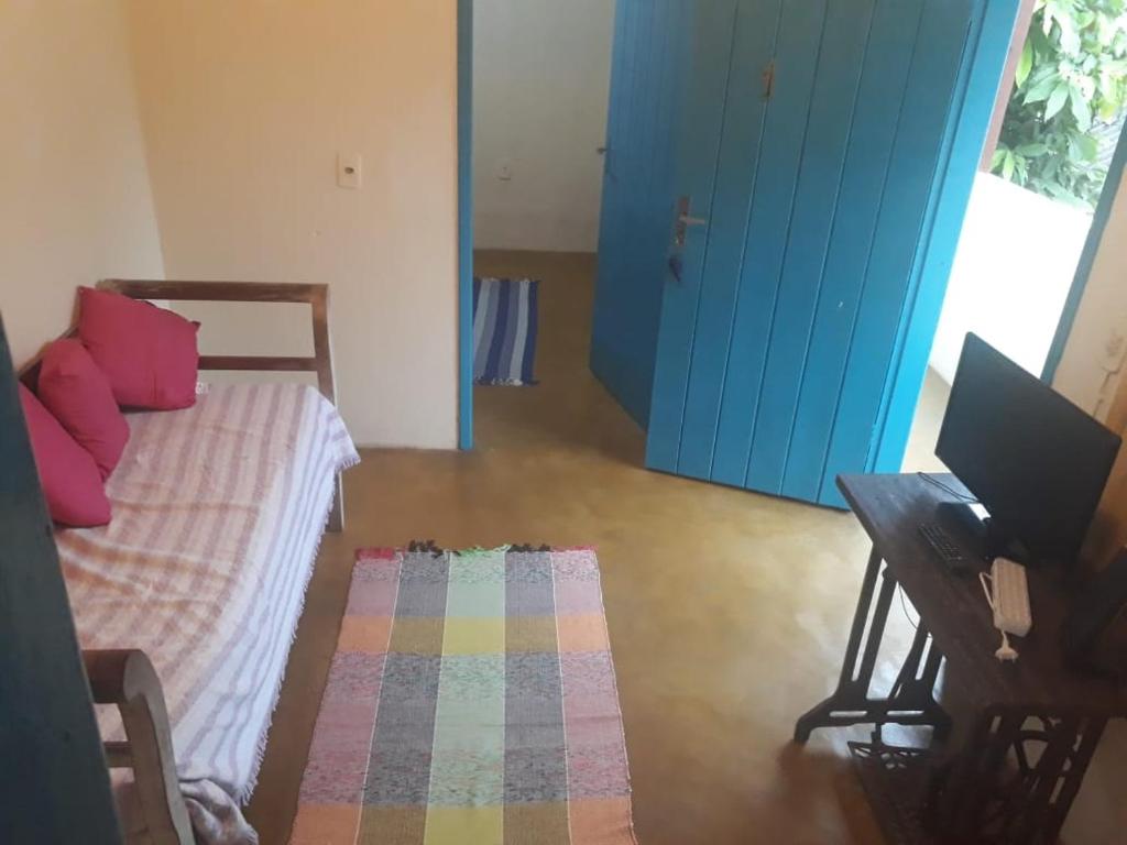 En eller flere senger på et rom på Casas santana