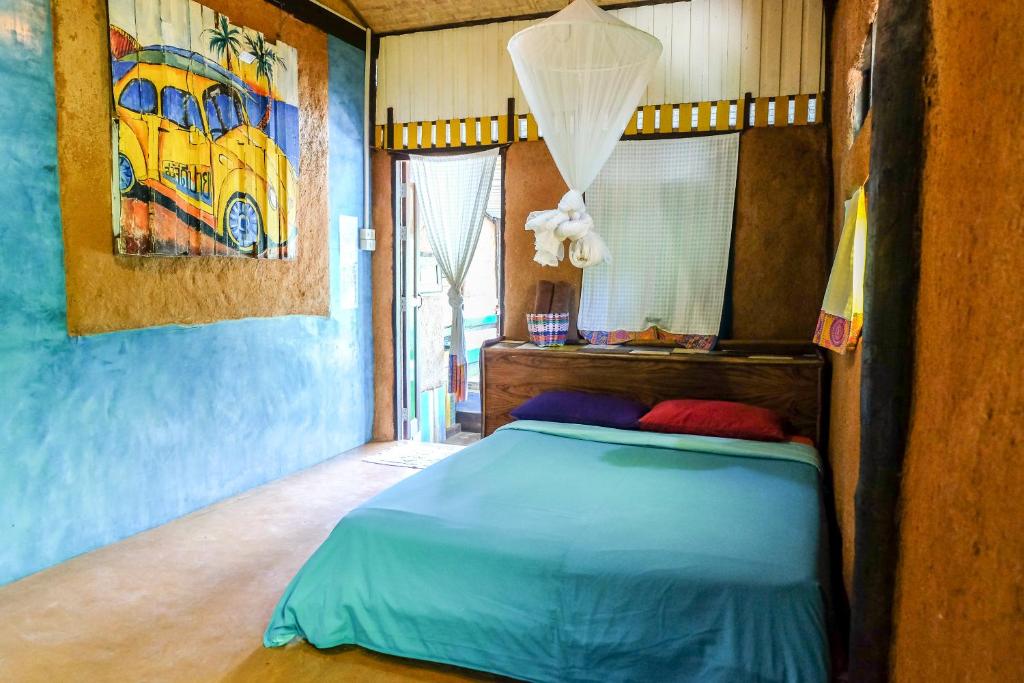 Postel nebo postele na pokoji v ubytování Sawasdeepai River Resort