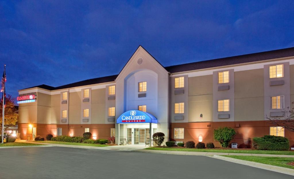 a rendering of a hotel at night at Candlewood Suites Rockford, an IHG Hotel in Rockford