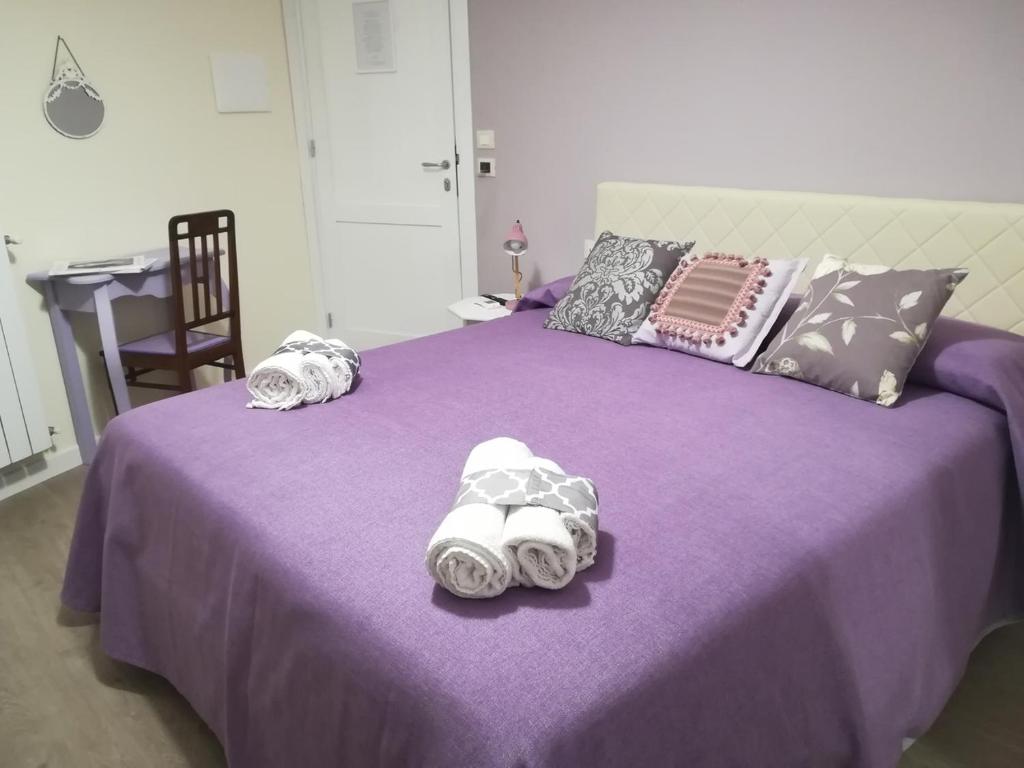 Łóżko lub łóżka w pokoju w obiekcie Persiane al Cassaro