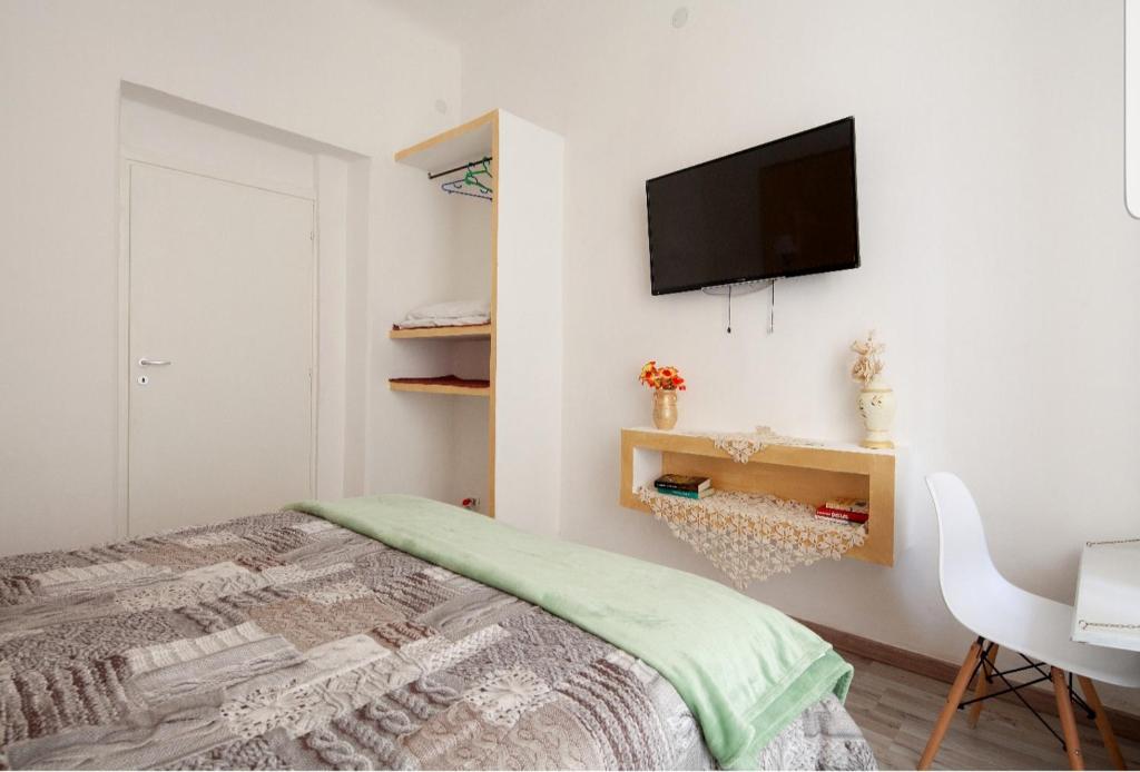 Postel nebo postele na pokoji v ubytování ControVento Apartament