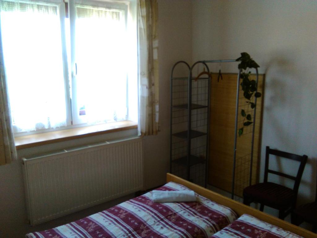 Postel nebo postele na pokoji v ubytování Pension Otěvěk