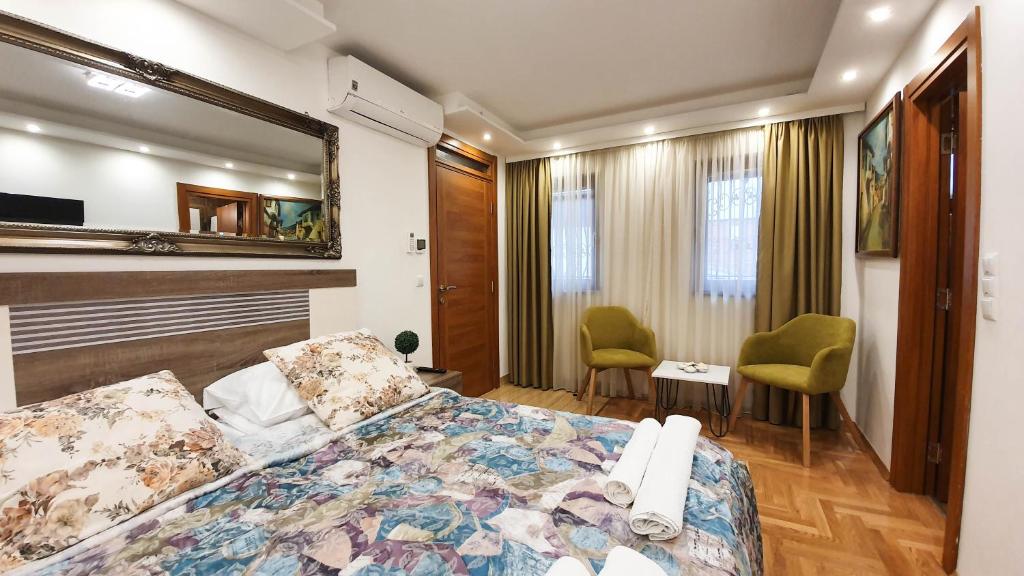 Кровать или кровати в номере Herc Apartments Sarajevo