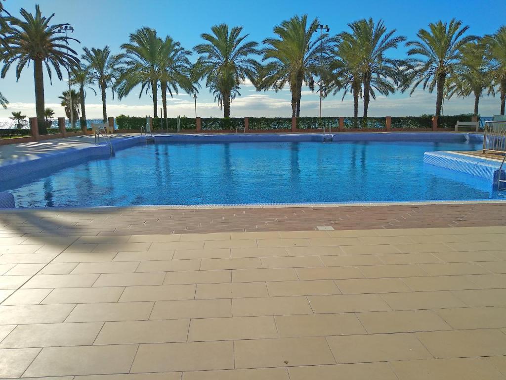 Bazén v ubytování Apartamentos Intercentro Algarrobo-Costa APARTAMENTOS TURÍSTICOS -INMOBILIARIA nebo v jeho okolí
