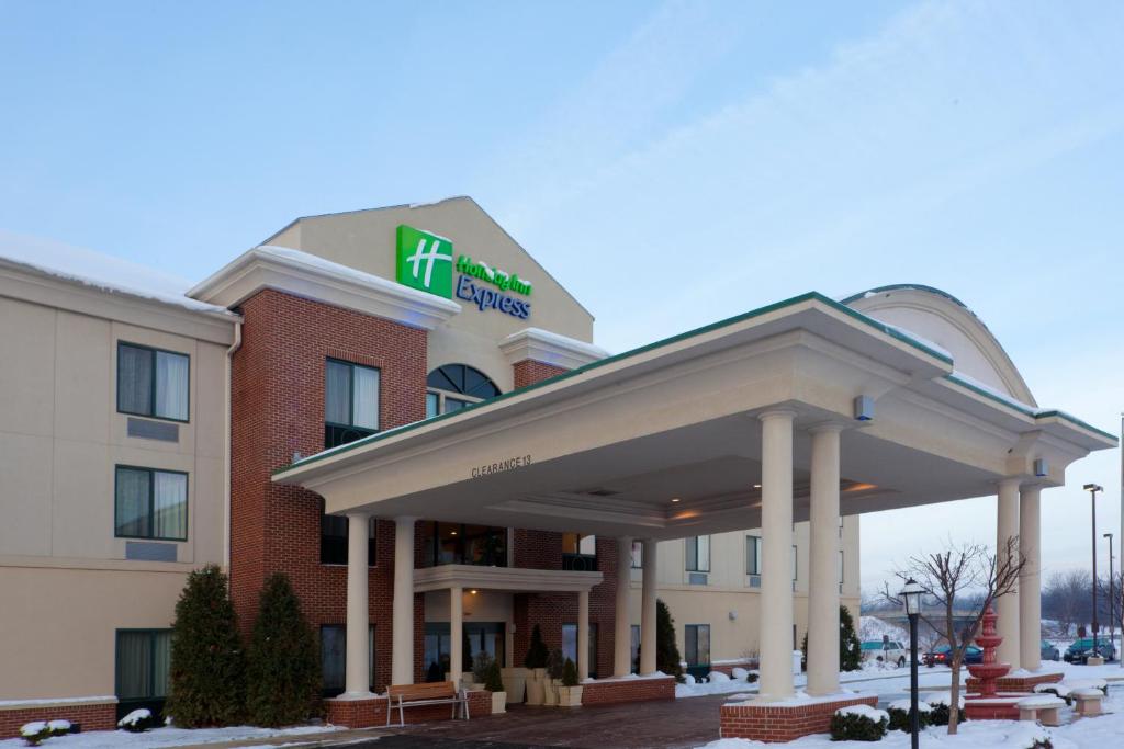 a hotel building with a sign on top of it at Holiday Inn Express Lordstown-Newton Falls/Warren, an IHG Hotel in Newton Falls