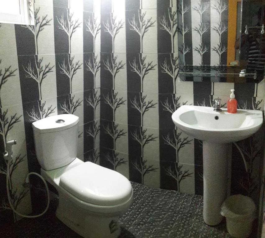 Koupelna v ubytování Apple Sara Home Stay