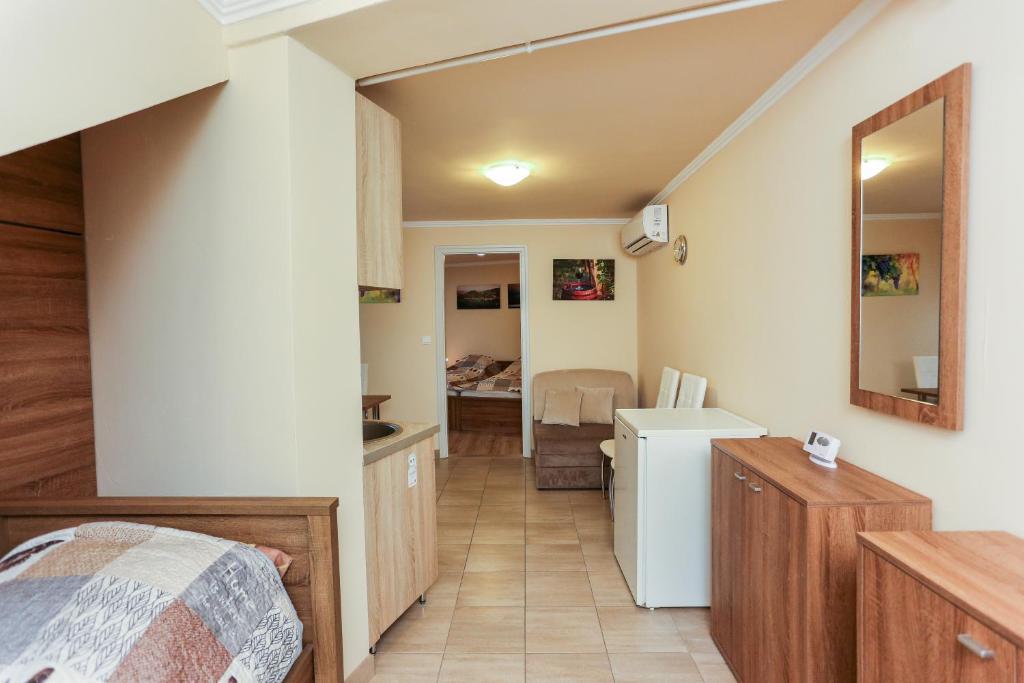 Posteľ alebo postele v izbe v ubytovaní GÁRDI APARTMAN