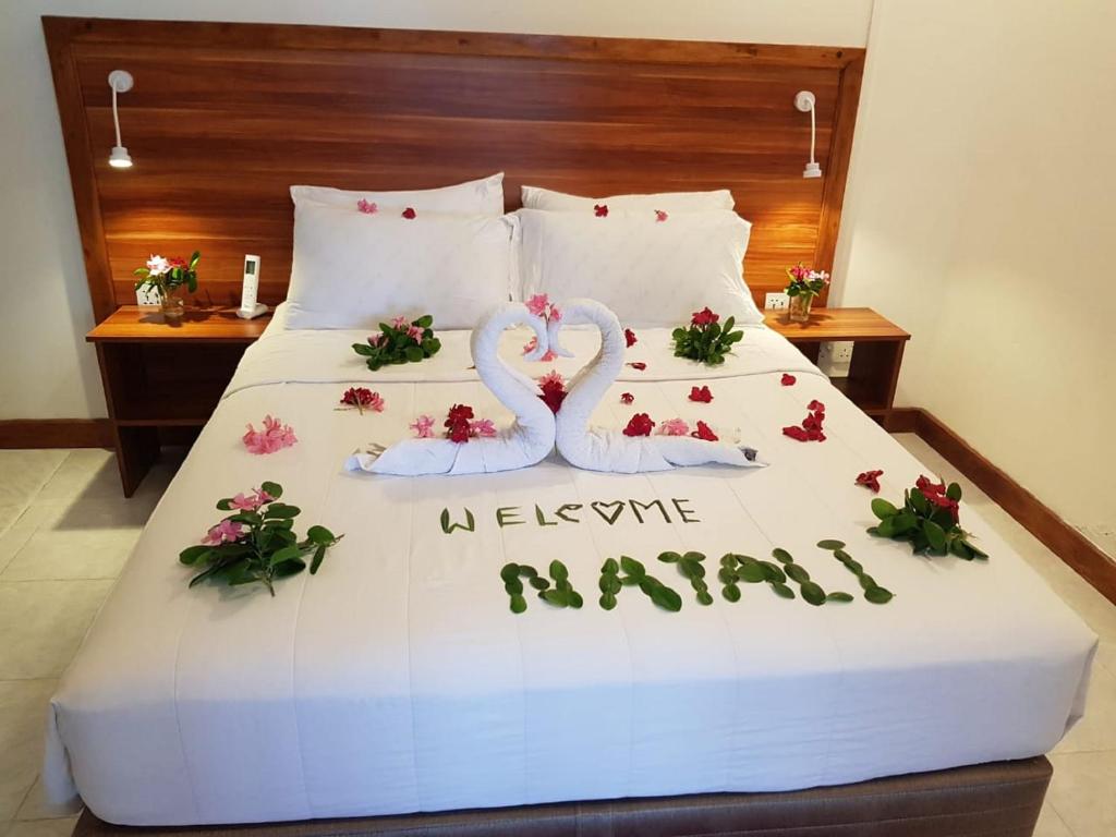 Postel nebo postele na pokoji v ubytování Batuta Maldives Surf View