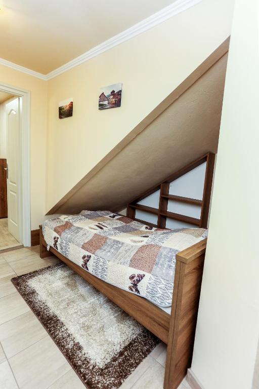 Posteľ alebo postele v izbe v ubytovaní GÁRDI APARTMAN