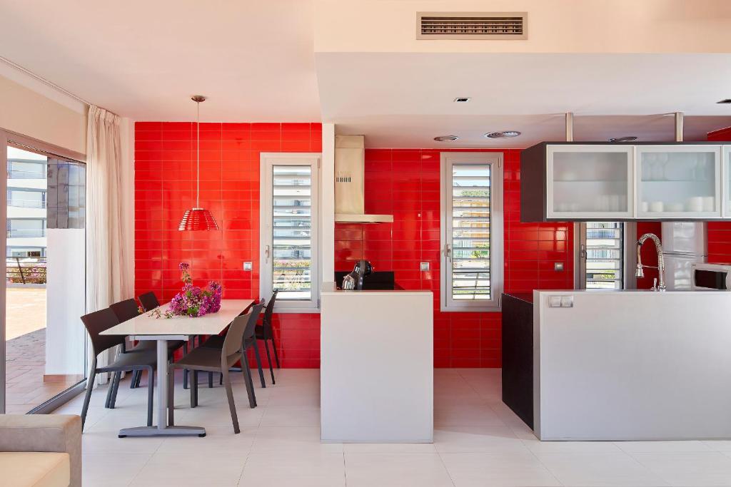 A kitchen or kitchenette at Apartamentos en Rocamaura