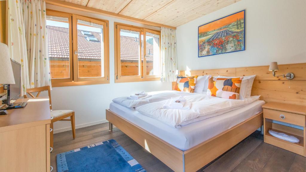 Postel nebo postele na pokoji v ubytování Chalet Luna