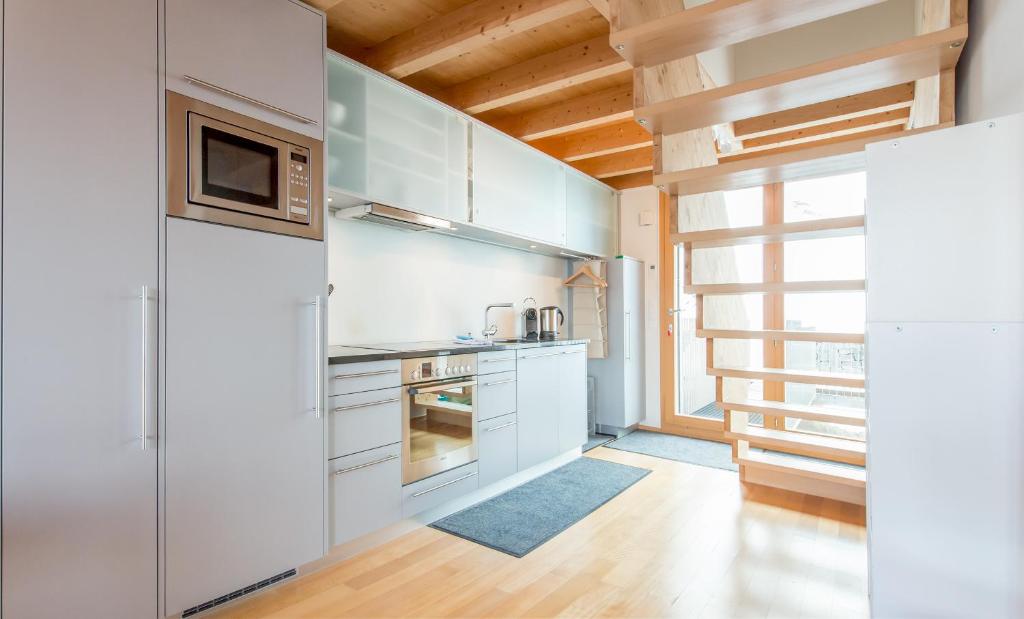 Kuchyň nebo kuchyňský kout v ubytování Chalet Roossi