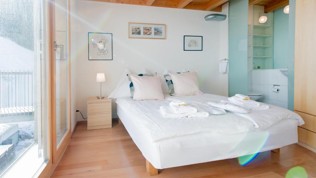 Postel nebo postele na pokoji v ubytování Chalet Roossi