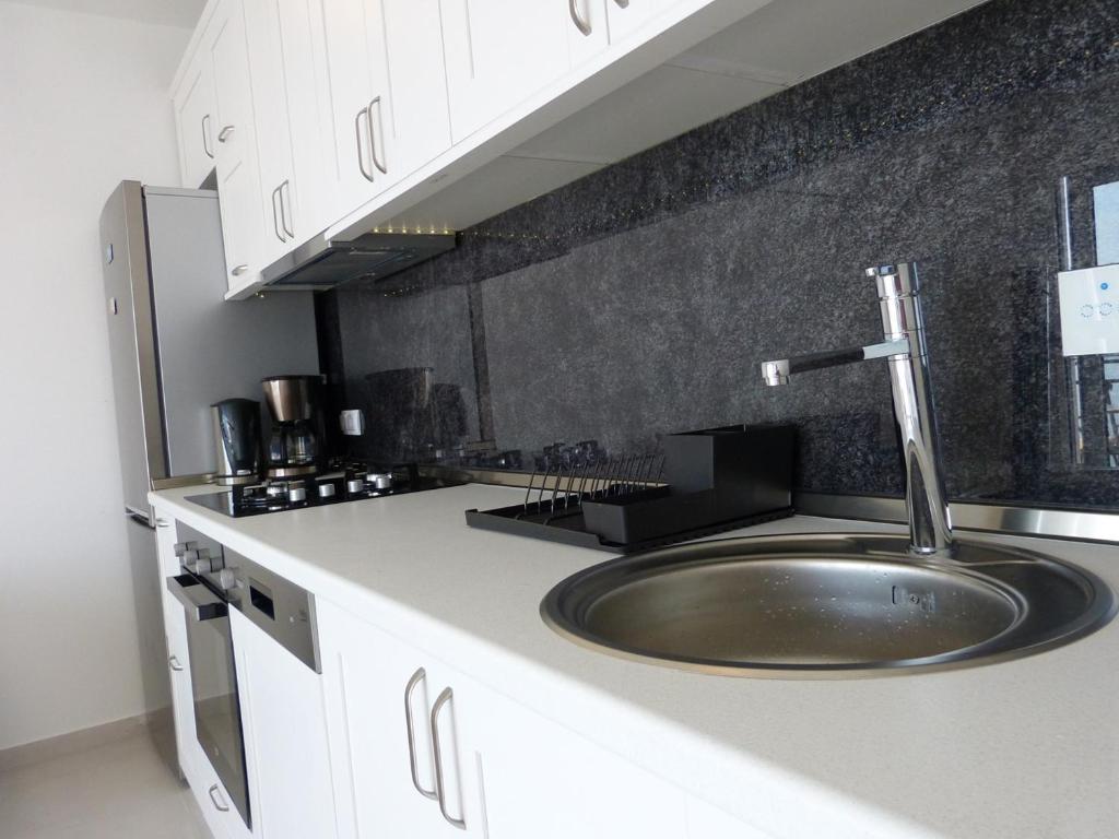 Kuchyňa alebo kuchynka v ubytovaní Apartment NoStress