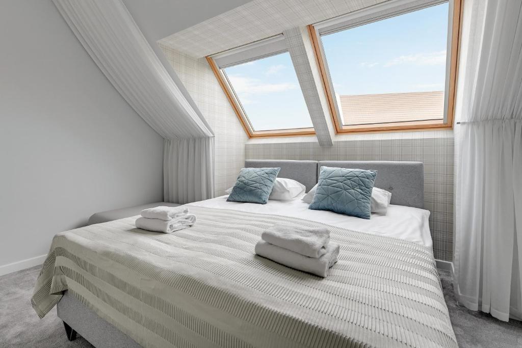 Posteľ alebo postele v izbe v ubytovaní GRANO APARTMENTS Gdańsk Motława SPA & Wellness