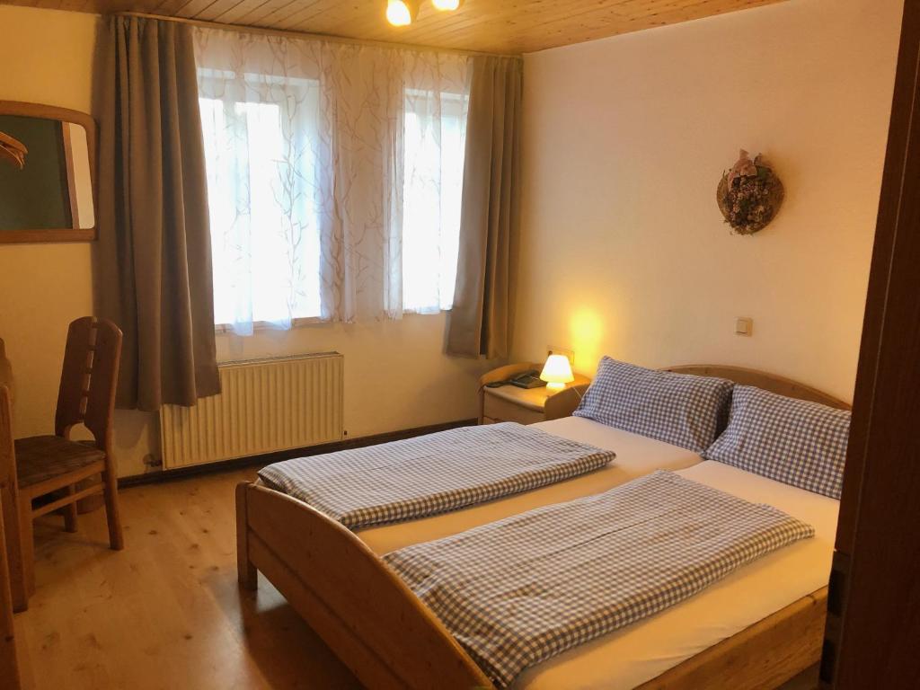 Postel nebo postele na pokoji v ubytování Hostaria del Castello