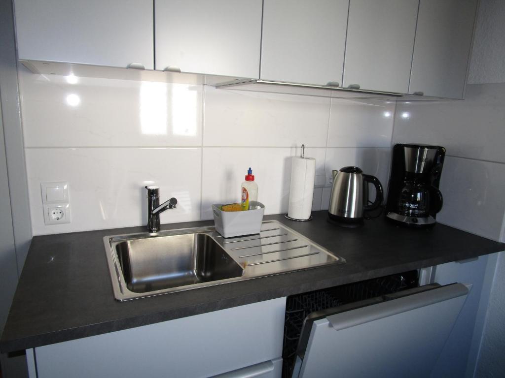 Kuchyň nebo kuchyňský kout v ubytování Villa Am Rosenfelspark