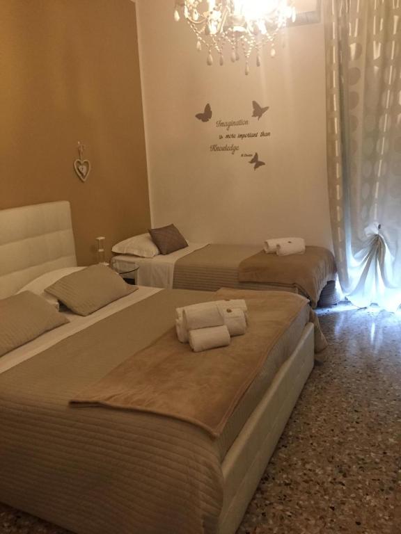 Postel nebo postele na pokoji v ubytování Casa Isabella