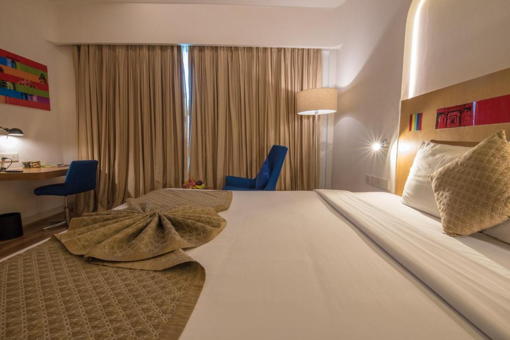 Postel nebo postele na pokoji v ubytování Park Inn by Radisson New Delhi IP Extension