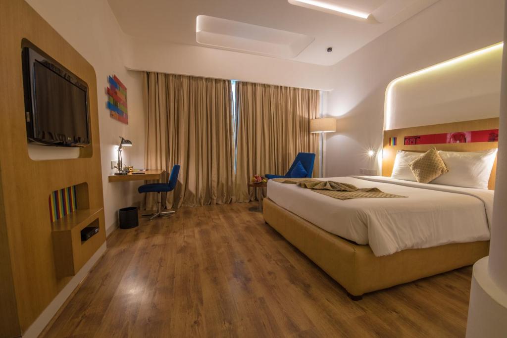 Postel nebo postele na pokoji v ubytování Park Inn by Radisson New Delhi IP Extension