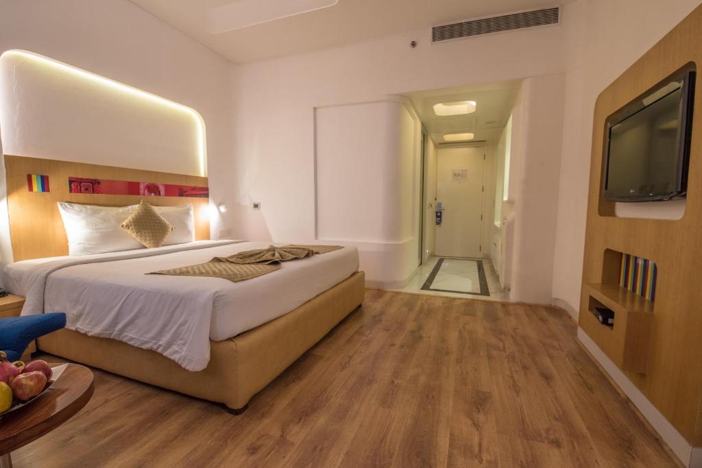 Postel nebo postele na pokoji v ubytování Park Inn by Radisson New Delhi IP Extension