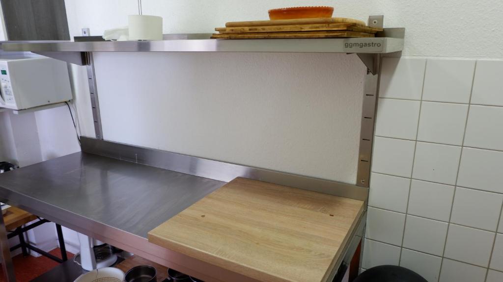 Kuchyň nebo kuchyňský kout v ubytování Hostel am Kurtti