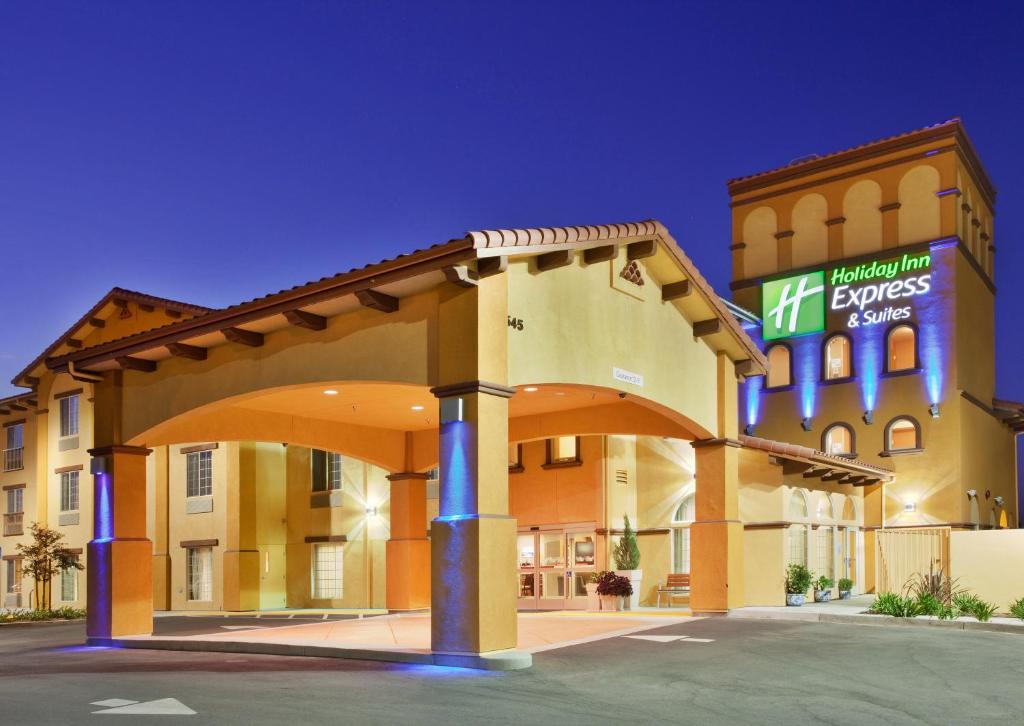 a hotel with a sign on the front of it at Holiday Inn Express Hotel & Suites Willows, an IHG Hotel in Willows