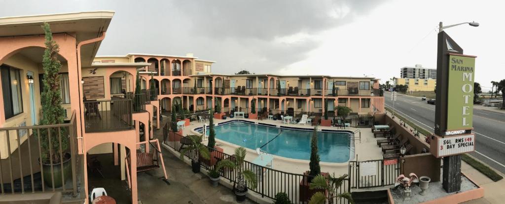 an aerial view of a hotel with a swimming pool at San Marina Motel Daytona in Daytona Beach