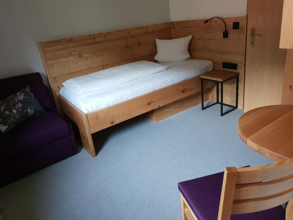 Postel nebo postele na pokoji v ubytování Gästehaus Wallner