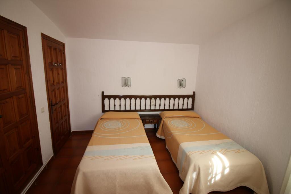 Postel nebo postele na pokoji v ubytování Casa la Borna