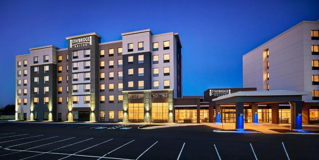 a hotel building with a parking lot in front of it at Staybridge Suites Niagara-On-The-Lake, an IHG Hotel in Niagara on the Lake