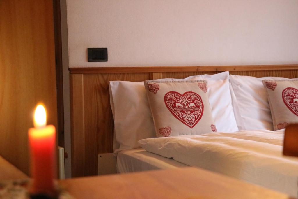 Postel nebo postele na pokoji v ubytování Residence Weissthor