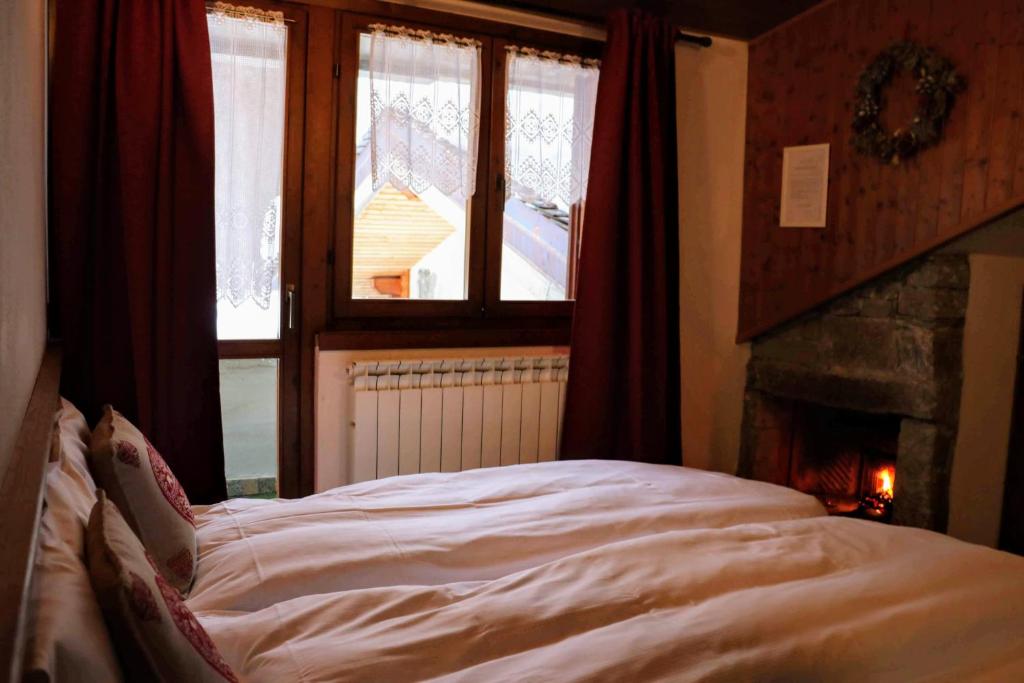 Postel nebo postele na pokoji v ubytování Residence Weissthor