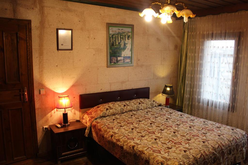 Postel nebo postele na pokoji v ubytování Coco Cave