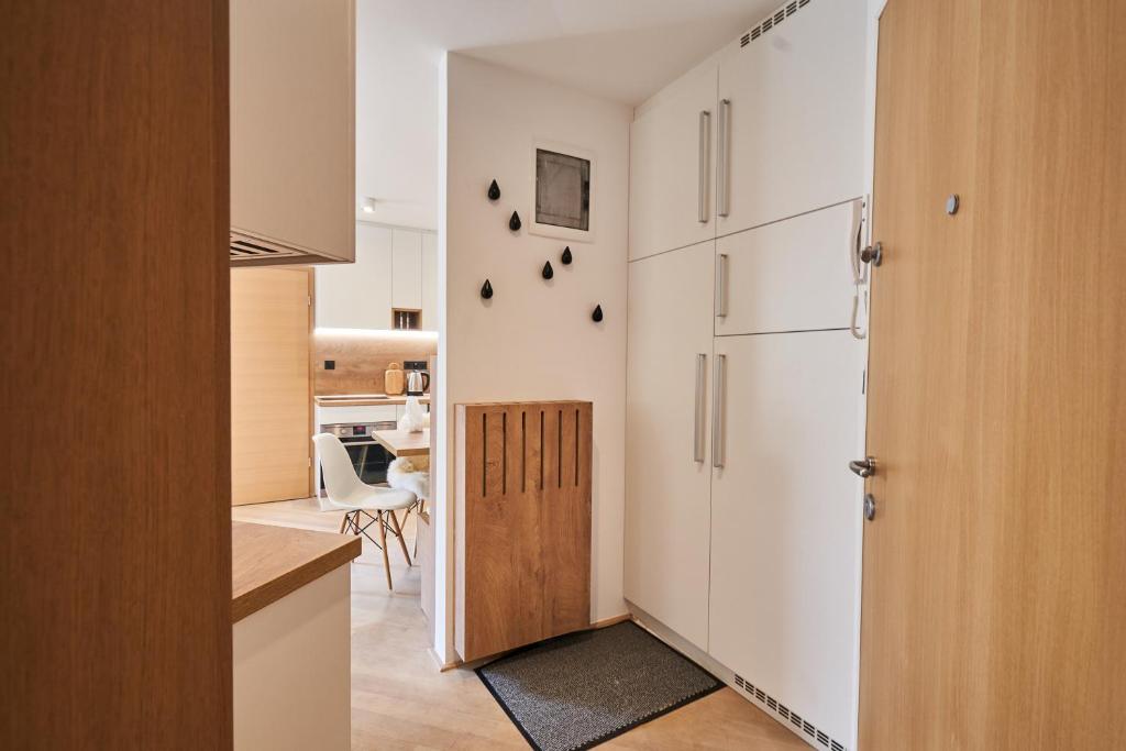 Kuchyň nebo kuchyňský kout v ubytování Cozy Apartment in the heart of Kranjska Gora
