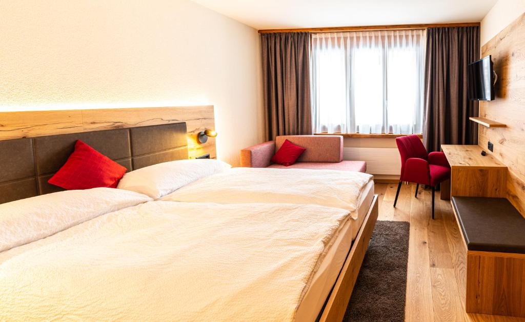 Postel nebo postele na pokoji v ubytování Hotel Restaurant Silbersand