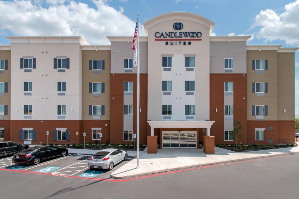 a rendering of a hotel with cars parked in a parking lot at Candlewood Suites - San Antonio Lackland AFB Area, an IHG Hotel in San Antonio