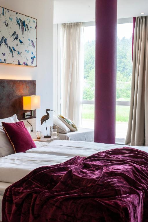 Postel nebo postele na pokoji v ubytování Business Class Hotel Ebersberg
