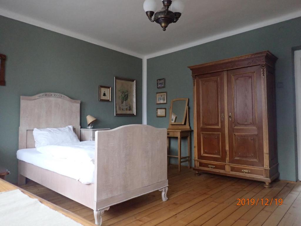 Postel nebo postele na pokoji v ubytování Penzion Leticia