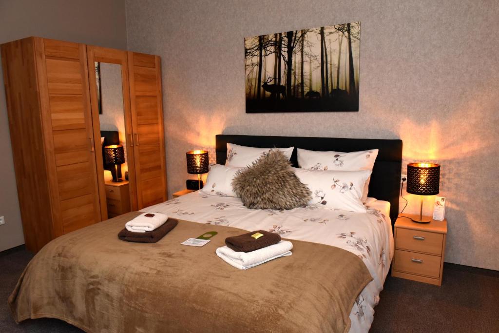 Postel nebo postele na pokoji v ubytování Hotel Wappenhof
