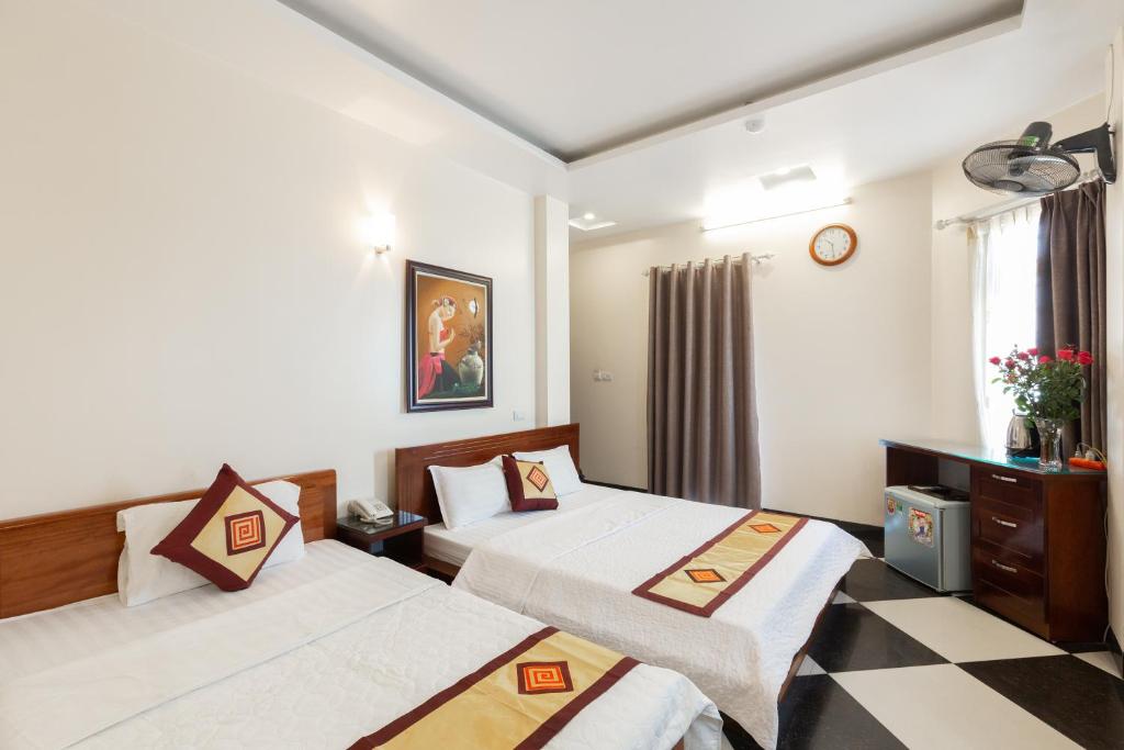 Postel nebo postele na pokoji v ubytování Titanic 2 Hotel